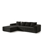 Canapé d'angle modulable en velours côtelé noir avec méridienne, sur fond blanc