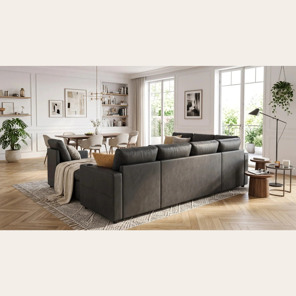 Dos du canapé en U gris anthracite dans un salon ouvert
